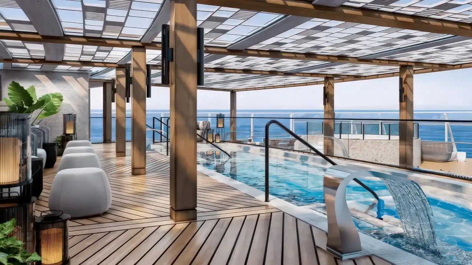 A sheltered indoor pool and lounge area aboard an Explora ship